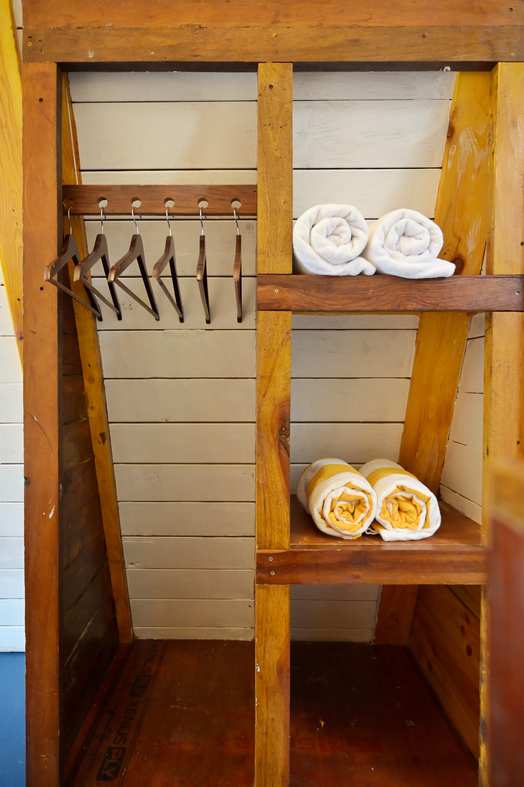 Minimalist storage and shelving in guest accommodation