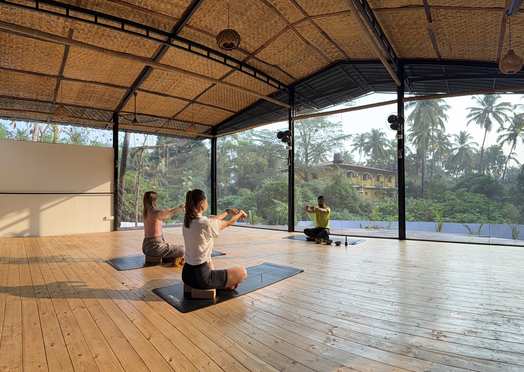 Morning yoga class in session at the LUMA yoga shala